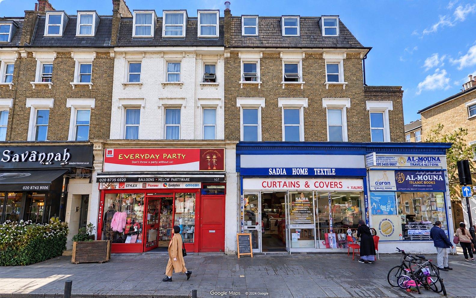 Street frontage with shops below and flats above, Shepherd's Bush
